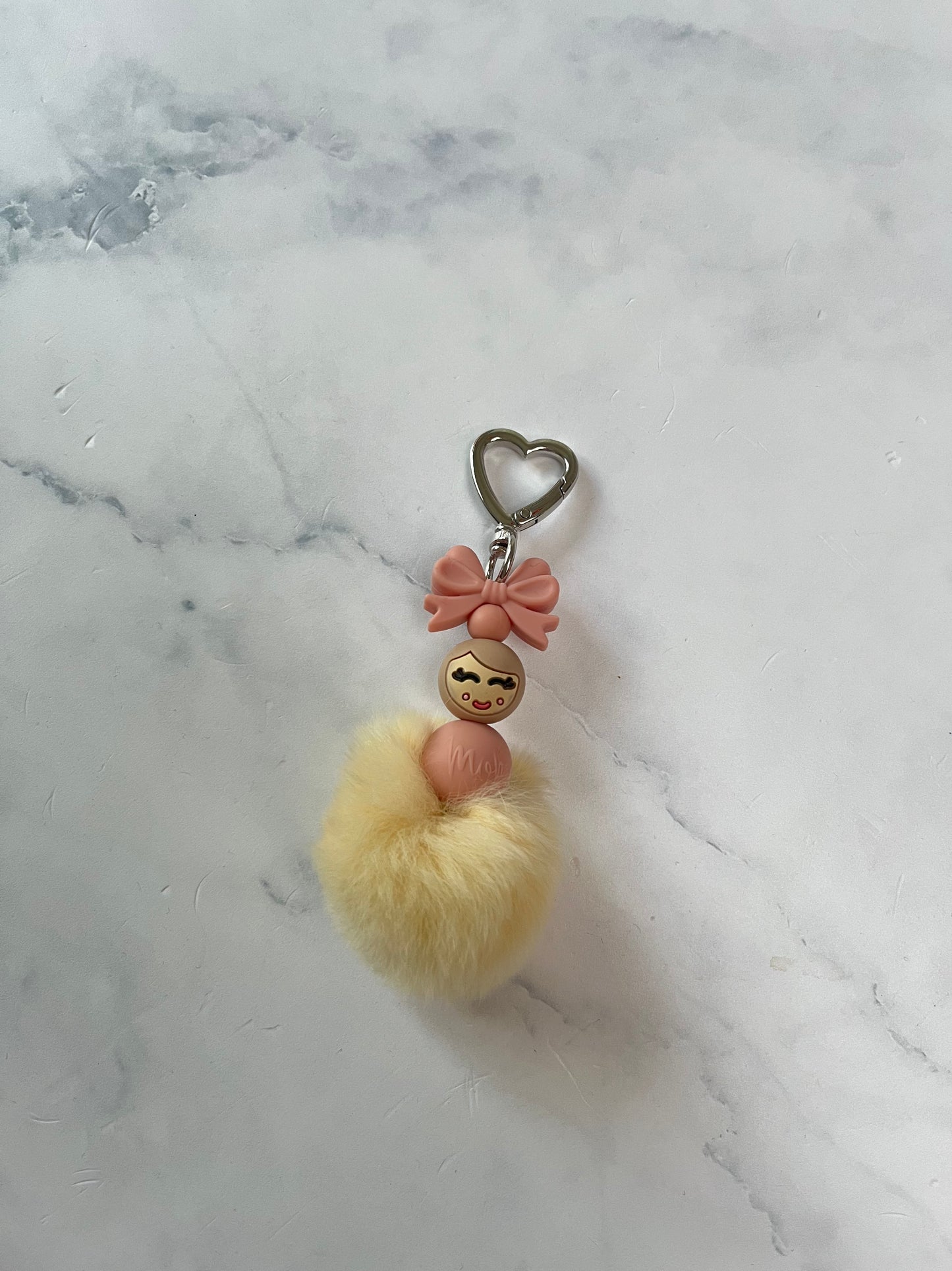 Mama van geluk met pompon