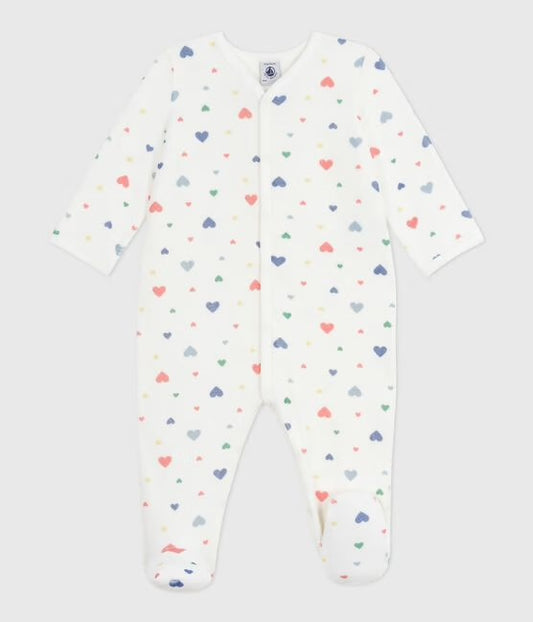 Fluwelen pyjama met voetjes - gekleurde hartjes