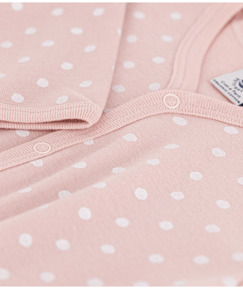 Pyjama met voetjes 'roze met stipjes'