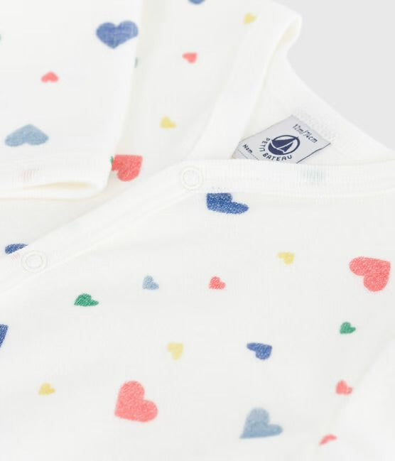 Fluwelen pyjama met voetjes - gekleurde hartjes